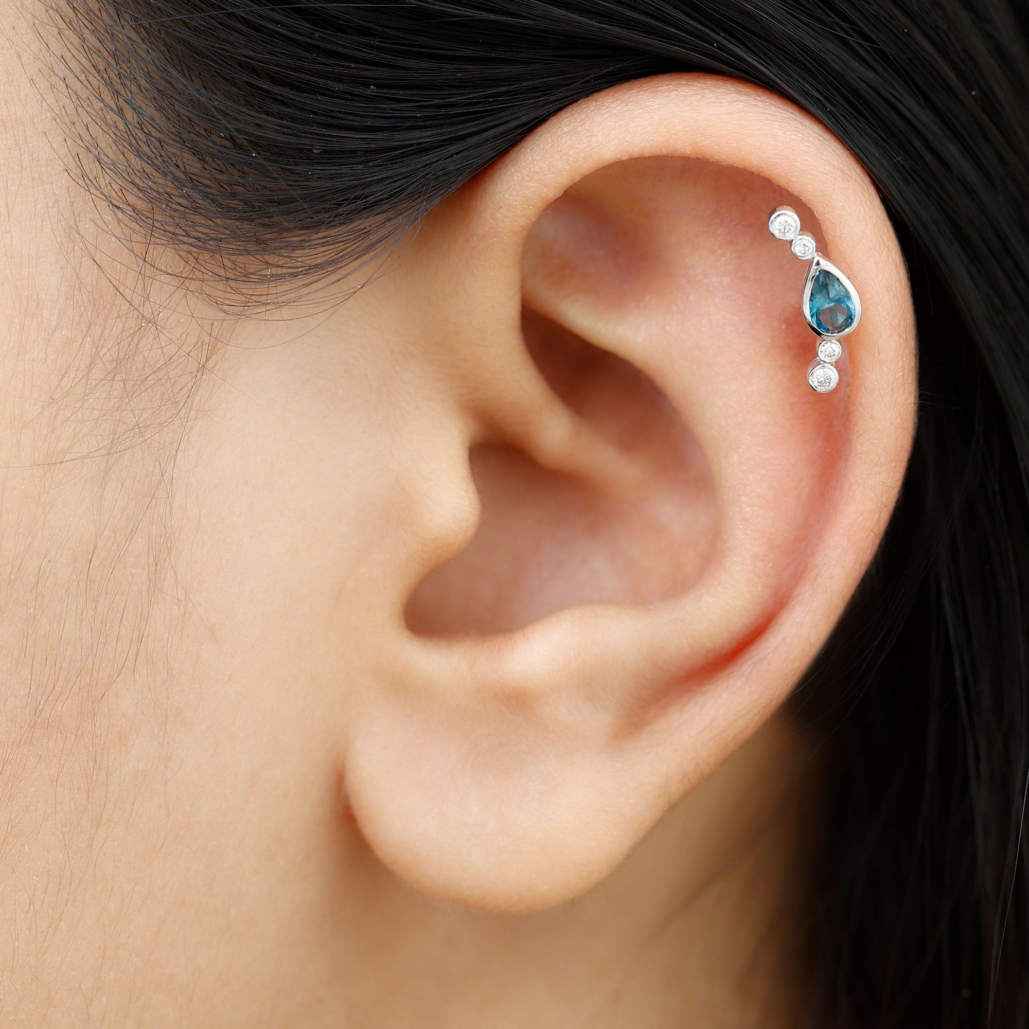 Rosec Jewels-Pear London Blue Topaz Crawler Earring with Moissanite