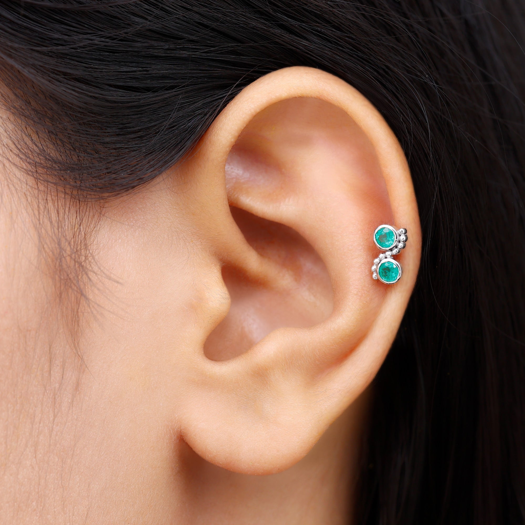 Rosec Jewels-Bezel Set Emerald Two Stone Helix Earring with Gold Beaded