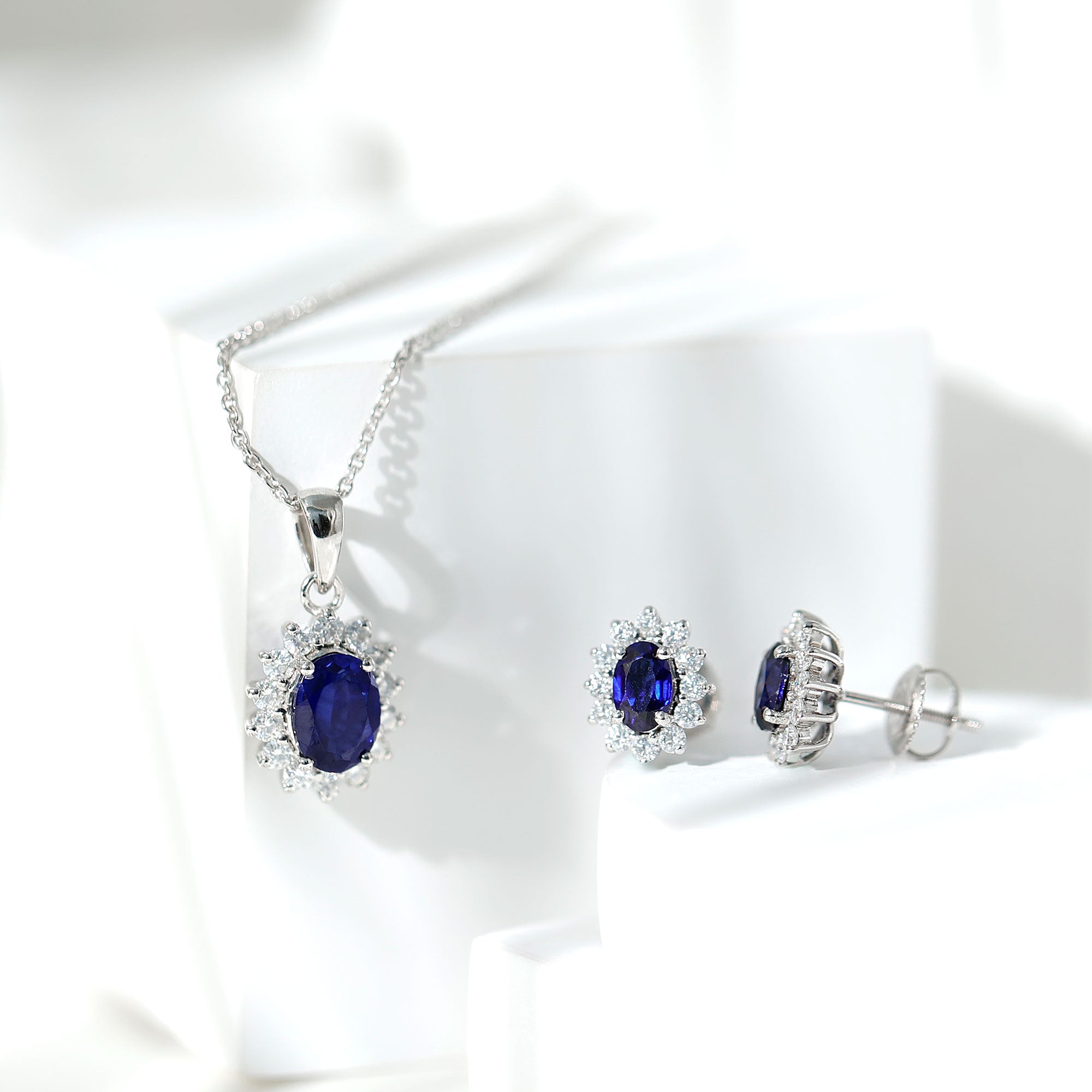 Classic Oval Cut Created Blue Sapphire and Moissanite Halo Silver Jewelry Set - Rosec Jewels