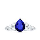 Rosec Jewels-Pear Cut Lab Grown Blue Sapphire Solitaire Ring with Diamond Trio